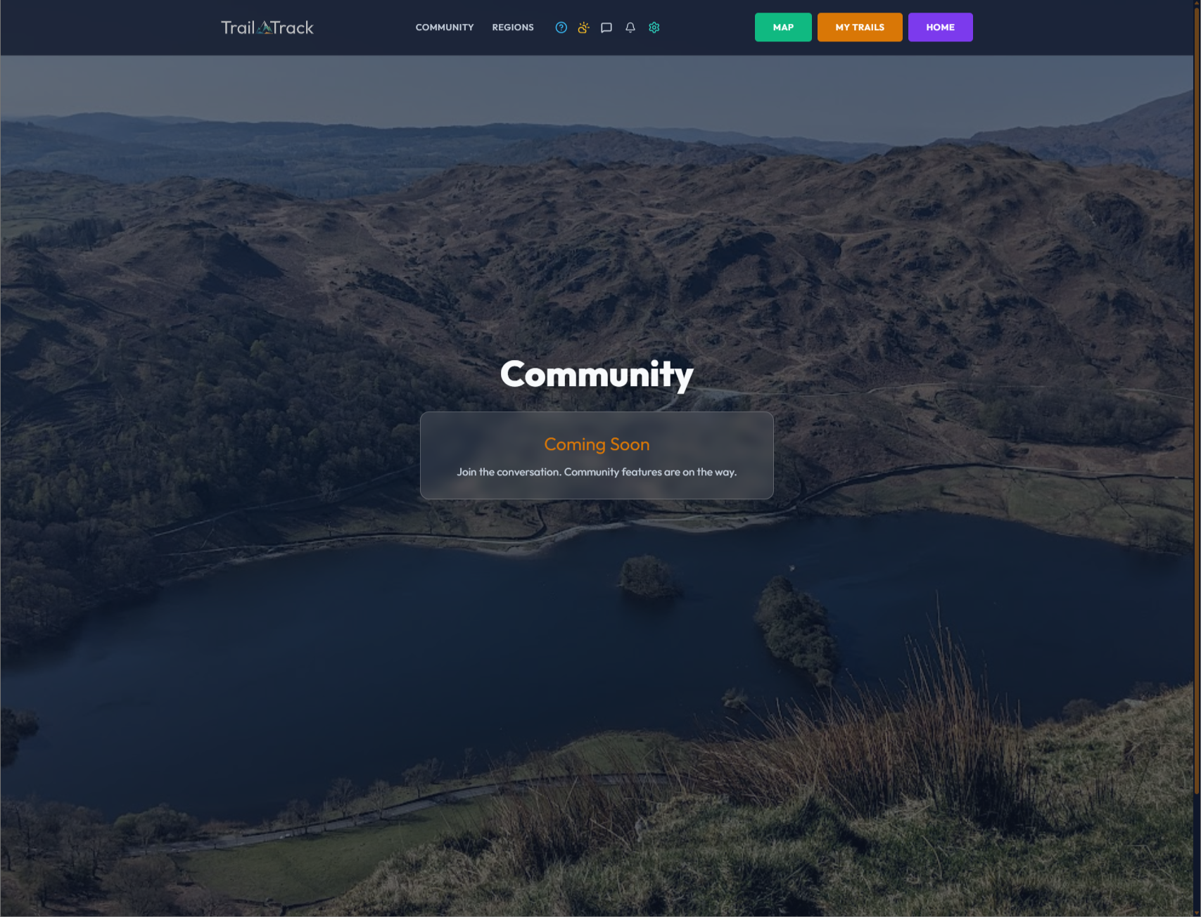 An image of the TrailTrack UK community page showing that it's coming soon over an image of a lake and mountains. 